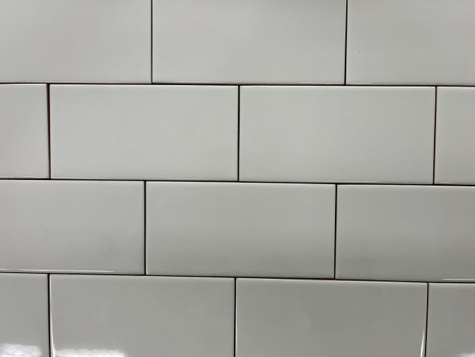glossy white rectangular tiles